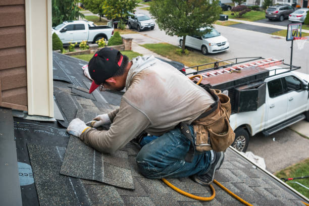 Professional Flat Roof Repair technician working in Pickett, WI